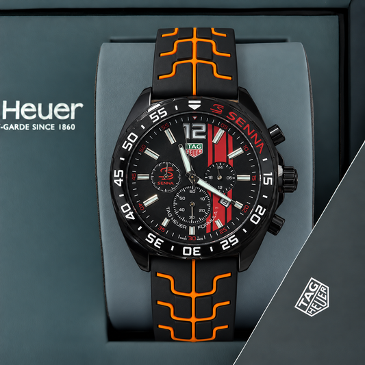 TAG Heuer Senna negro con franjas rojas y malla negra con líneas naranjas