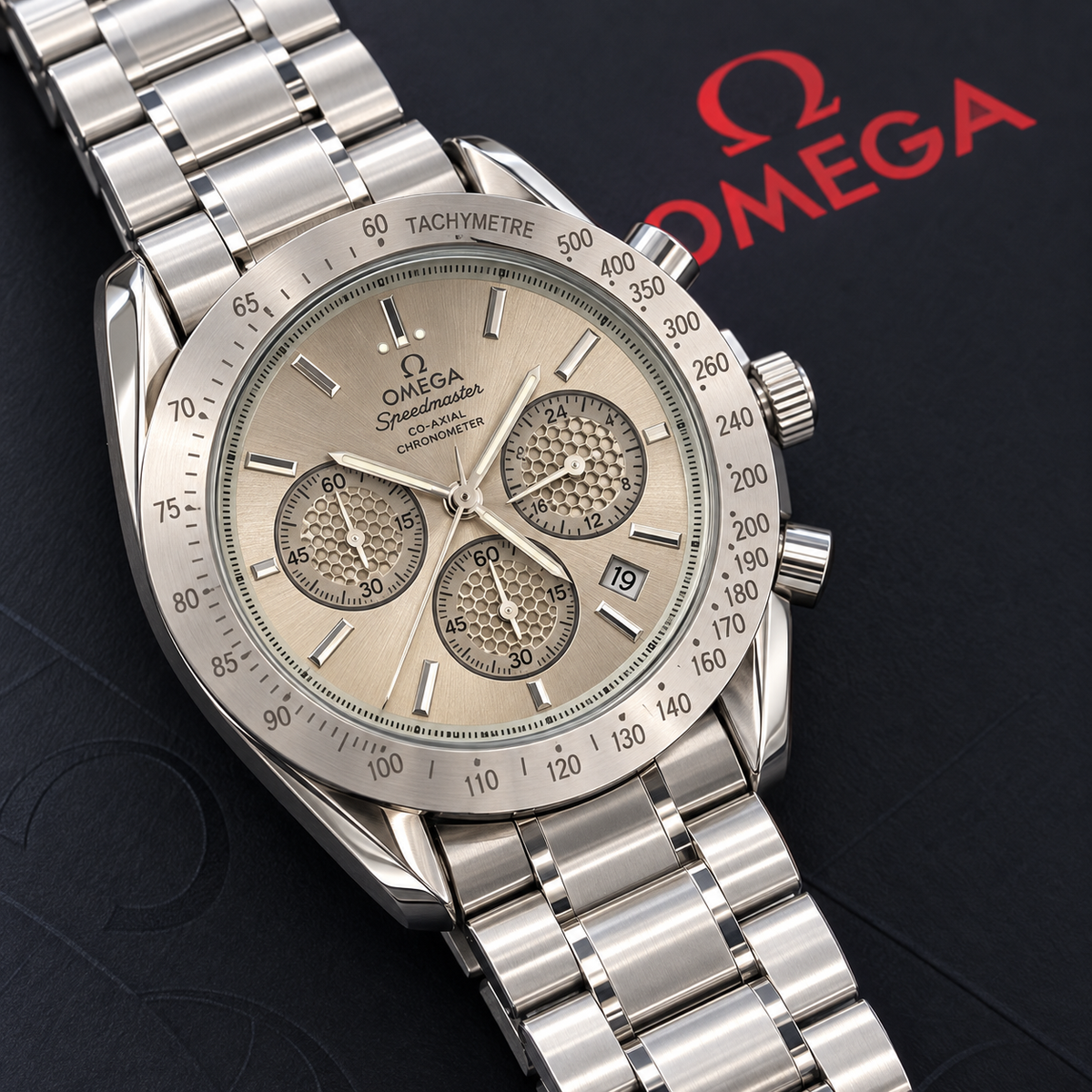 Omega Speedmaster dial champagne bisel acero malla acero